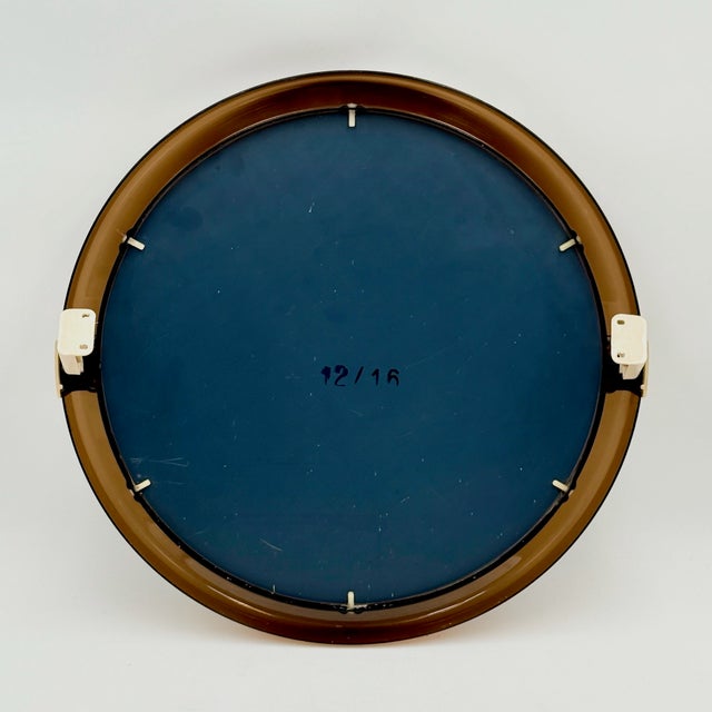 This French wall mirror was produced in the 1970s and is attributed to Allibert, a manufacturer known for innovative...