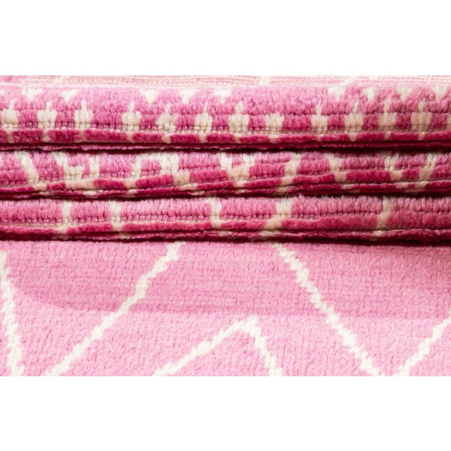 Beautiful Contemporary Moroccan Style Runner Rug, hand-knotted Wool with Pink field. This piece has multi-color accents in...