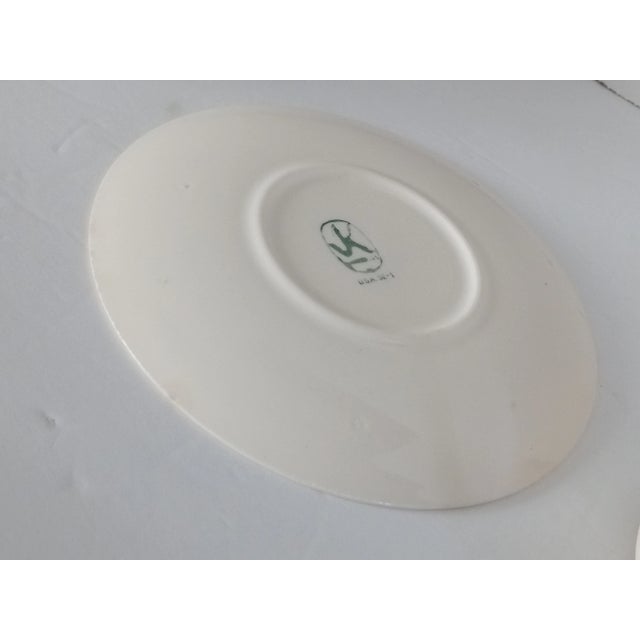 Vintage porcelain gravy server set. General dimensions are about the server. Dish dimensions are Diam. 6.25 x H .75