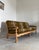 Danish oak sofa in the original striped wool upholstery. In the style of Henning Kjærnulf and bearing some resemblance to...