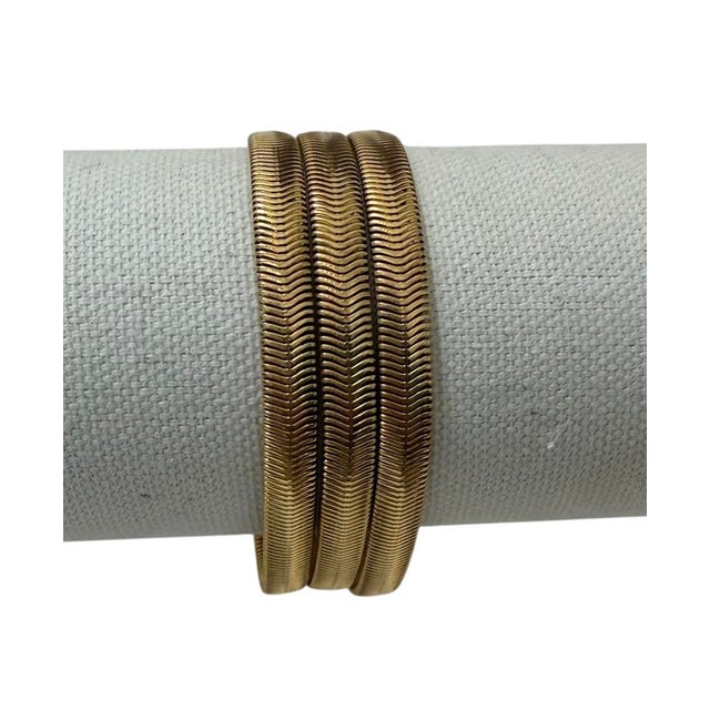 Vintage 1980’s snake or herringbone gold tone bracelet. A classic timeless style that will look great dressed up or down....