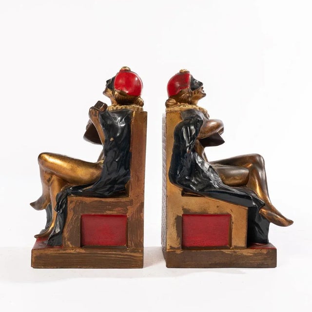 Pierrot Playing Mandolin Bookends make a great addition to your library. Made in the 1920s.
