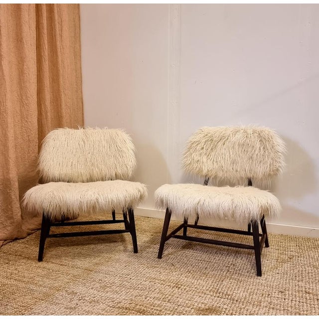 A pair of iconic TeVe-chairs by Alf Svensson for Ljungs industrier, Sweden mid-1900s. Reupholstered in Maison Pierre Frey-...
