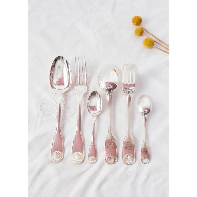 The set is composed by 36 pieces: 12 forks, 12 soup spoons and 12 tea spoons. All monogrammed with the A. C. initials. 84...