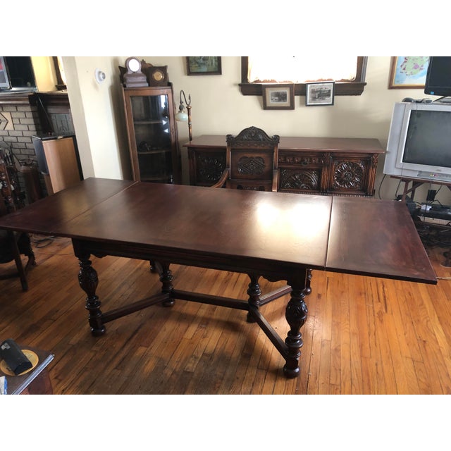 Early 20th Century Jacobean Style Carved Oak Dining Room Set with