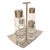 A sophisticated and modern Sambonet Linea Q condiment set made of 18/10 stainless steel and glass. Linea Q is...