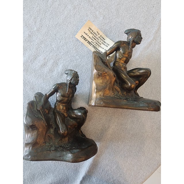 The product is a pair of medium-sized bookends featuring a Native American subject, crafted of bronze in 1928 by C Veith &...