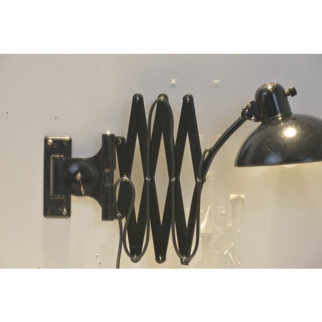 We offer a scissor-type wall light with a medium-sized shade from the exemplary idell lighting catalog. After wall...