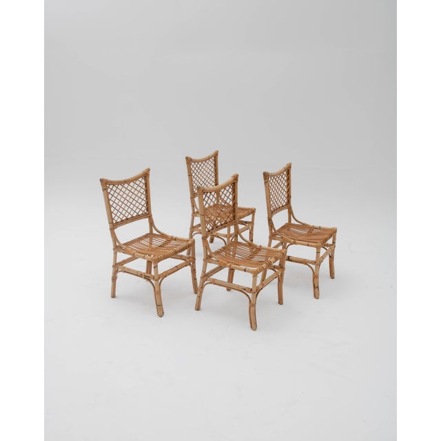 A five-piece dining set, designed following the most sophisticated trend in natural fiber furniture in 1970s continental...