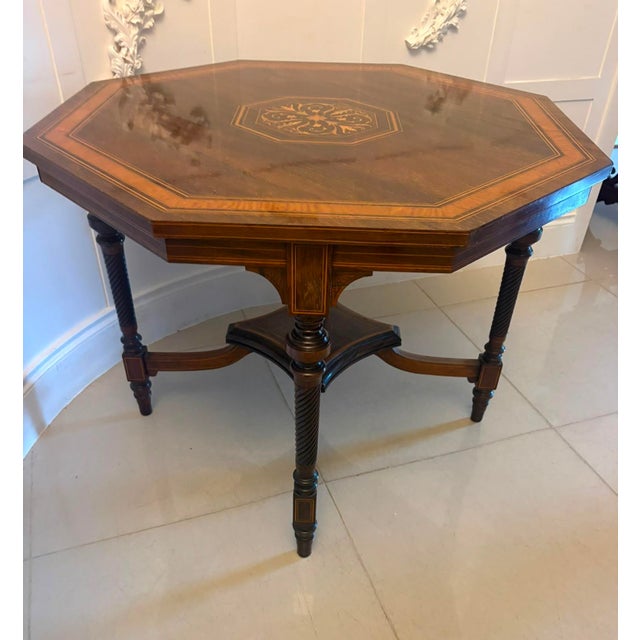 A superb quality Victorian rosewood centre table of elegant octagonal form, standing on four beautifully turned and spiral...