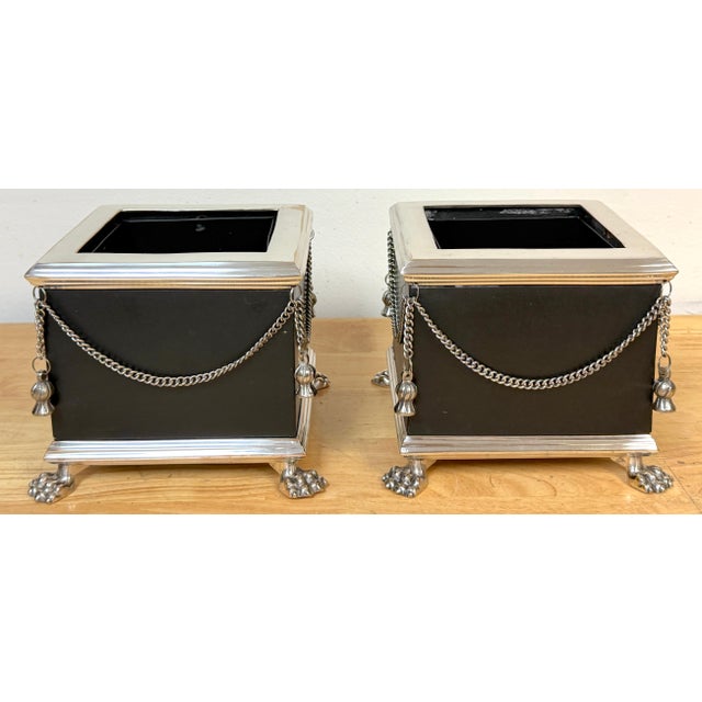 Pair of Russian-Style Neoclassical silver-plated bronze and leather cachepots are finely conceived decorative objects that...