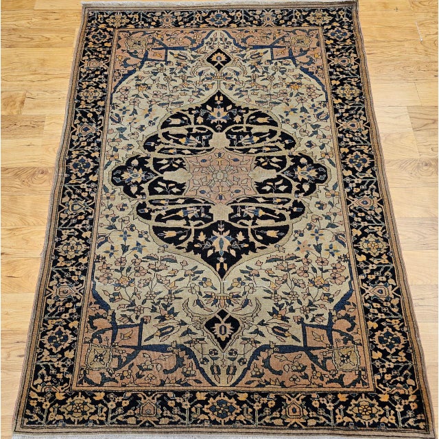 "This exceptional 19th century Persian Farahan Sarouk area rug exemplifies the artistic sophistication and technical...