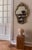 Elegant green Murano glass hanging mirror with understated decorative details and a refined Venetian aesthetic. Circa...