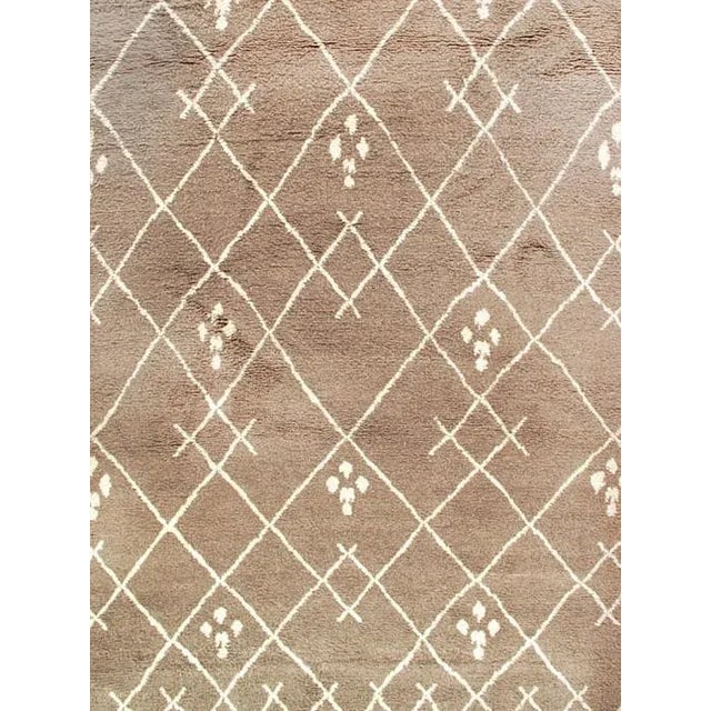 This Moroccan Area Rug will fill your room with the warmth, mystery and tribal rhythms of culture, inspired by authentic...