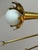 Jonathan Adler Small Brass Sputnik Chandelier A modern riff on a mid century design. Custom laser-cut cups crown each bulb...