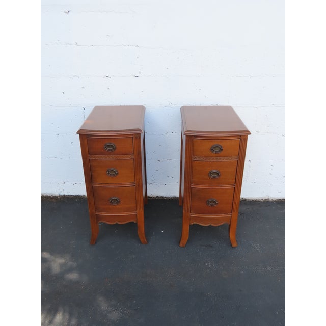 This beautiful Pair of Nightstands is made of wood, solid wood, mahogany, veneer, and metal. The Tables were converted...