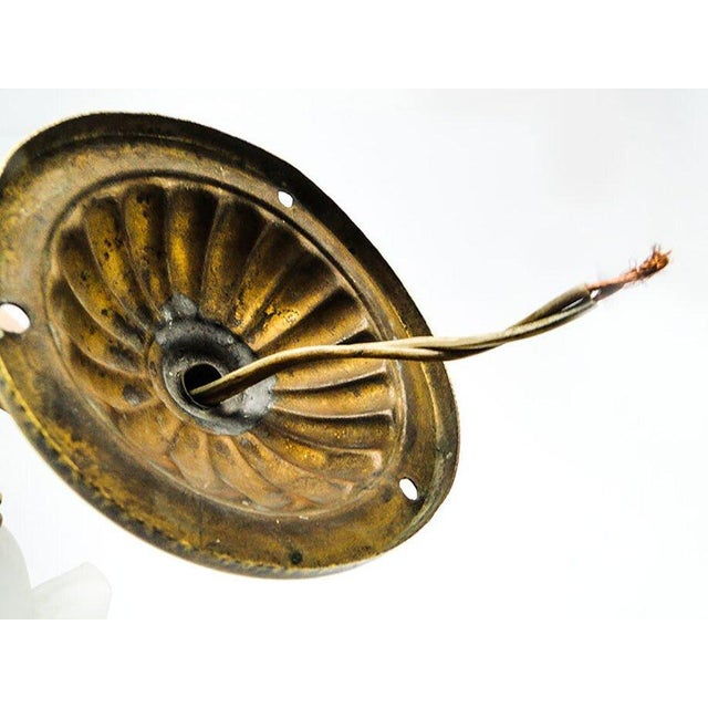 The Art Nouveau wall lamp comes from the beginning of the 20th century. It is in good condition and has a delicate patina....