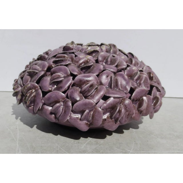 Ceramic flower vase, Handmade in a field of peapod flowers with a central opening to hold stems. Beautifully made ceramic...