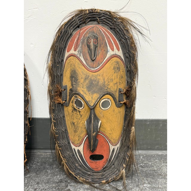 Design Plus Gallery presents a Set of Two Sepik River Mask from Papua New Guinea. The masks are hand-carved and fiber-...