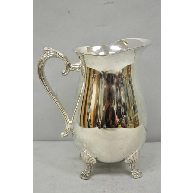 Vintage Victorian Style Silver Plated Bulbous Footed Lemonade Water Pitcher. Circa Late 20th Century. Measurements: 8.75"...