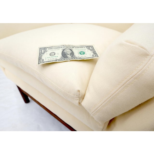 Pair of Danish Mid-Century Modern solid rosewood frames rounded shape new soft beige wool upholstery lounge club chairs....