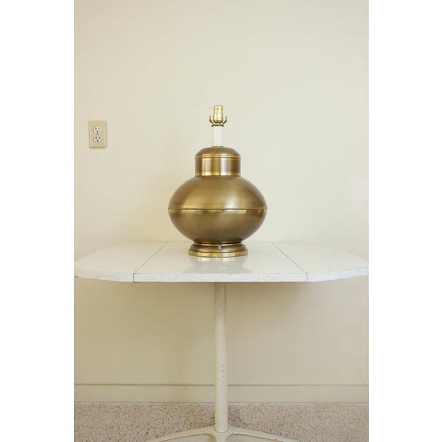 Here's a unique take on vintage Art Deco design, in the form of this brass table lamp. Made of brass, this piece is in...