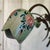 1950-60s chandelier in ceramic painting height: 58 width: 65 This piece is attributed to the mentioned designer/maker. It...