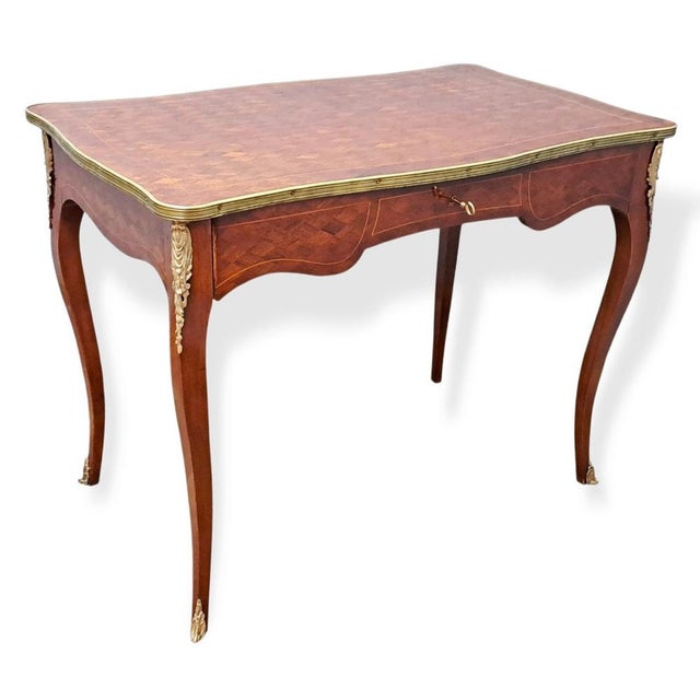 Elegant French Plat Bureau – Napoleon III Period Splendid French Louis XV-style center desk dating back to the second half...