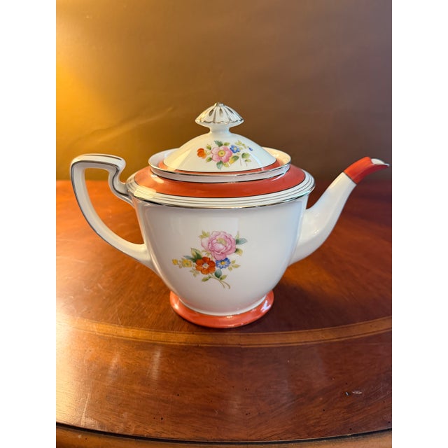 The Vintage Noritake M Tea Pot and Sugar Bowl N749 Handpainted ca.1950 is a collectible set made of bone china with a...