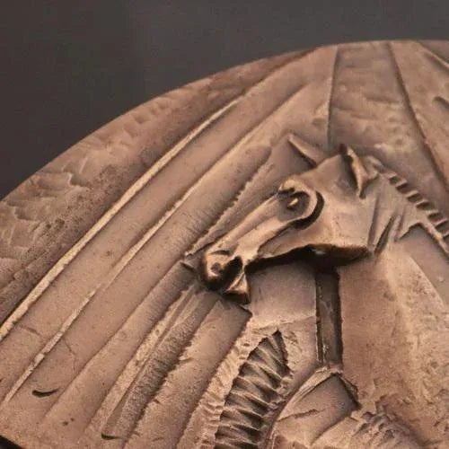 Add a touch of culture and sophistication to your space with this charming decorative bronze object depicting the Nobel...