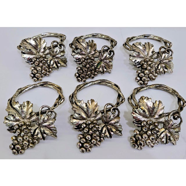Bring sculptural vineyard charm to the table with this set of six vintage Arthur Court grapevine napkin rings, each richly...