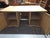 A substantial German pine partner's desk featuring a thick plank top resting on twin cupboard pedestals. Crafted from...