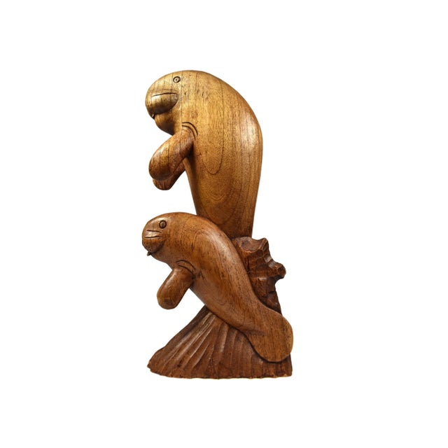 Hand carved wooden sea lion statue figurine carved from solid wood is a perfect accent for seaside, tropical or nautical...