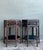Infuse your home with the organic warmth and architectural allure of this pair of vintage burnt bamboo side tables. A...