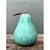 This vintage decorative pear is a plump, sculptural fruit modeled in plaster and finished in a soft, chalky green. The...