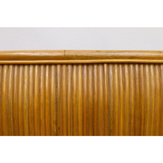 Pair of magnificent 70s armchairs in bamboo and exotic wood Very solid structure finely worked with decorations on the...