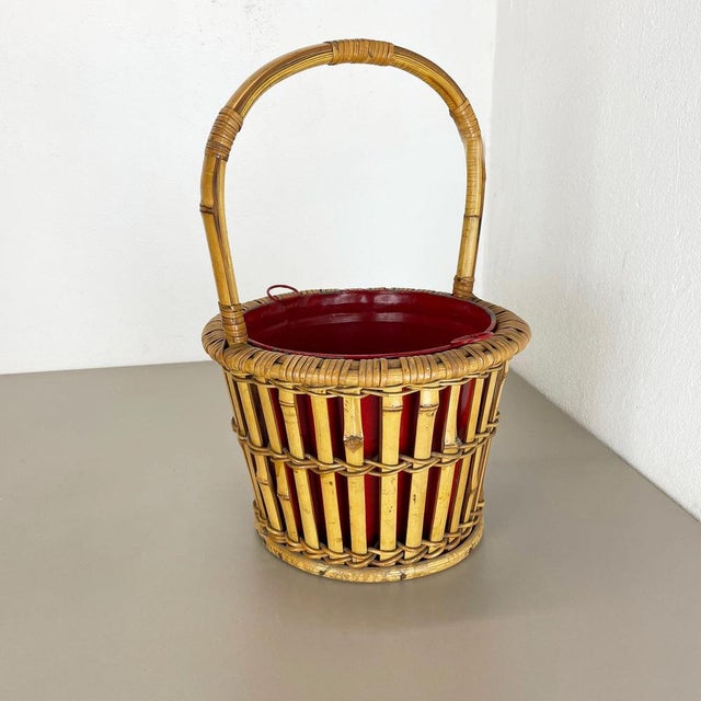 Article: modernist bamboo and metal plant pot stand Origin: France Decade: 1960s : This original modernist plant pot stand...