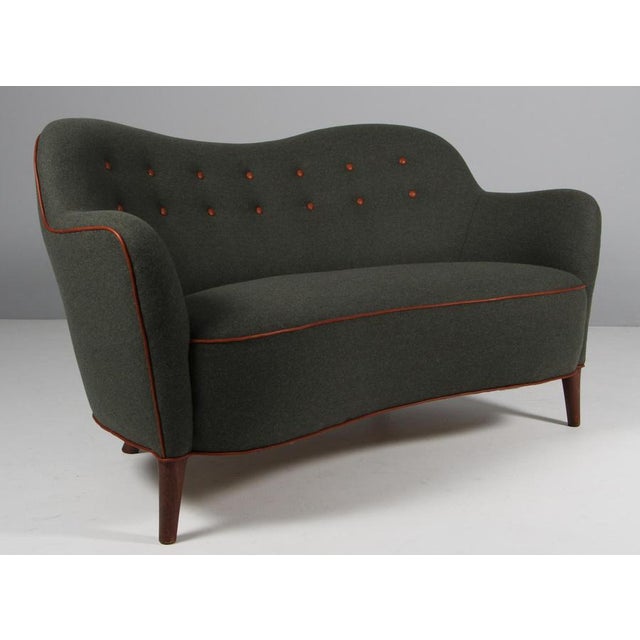 Slagelse Møbelværk two seat love sofa new upholstered with Bottle Green Magrethe wool fabric, buttons and details from...