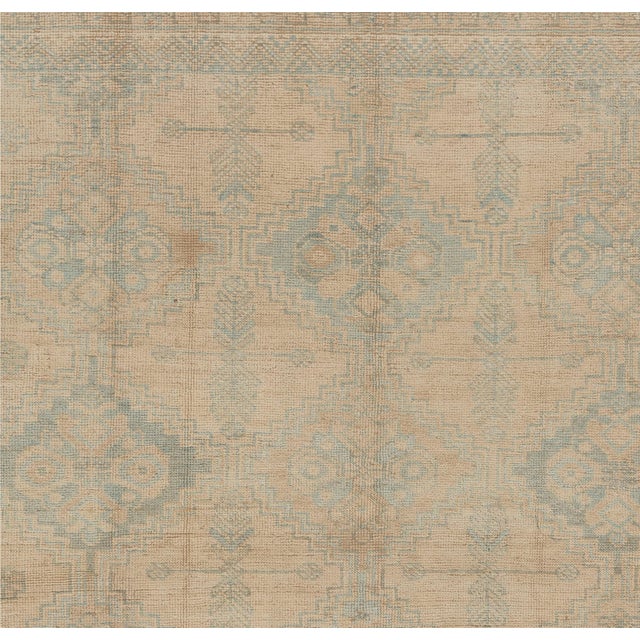 A beautiful hand-knotted rug, traditionally crafted by skilled artisans using fine-quality wool. The hand-knotted...