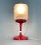 Vintage table lamp made of red and white plastic and glass. Produced by Elektroinstala Jílové in Former Czechoslovakia in...