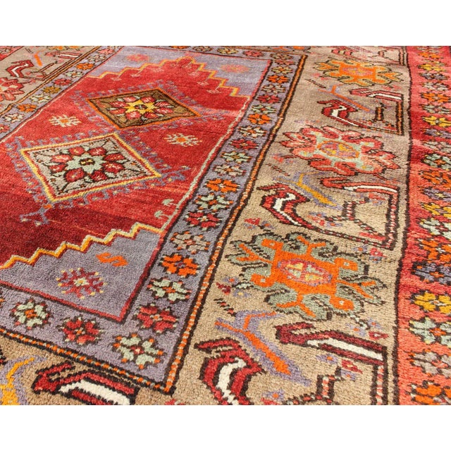 Mid 20th Century Colorful Antique Turkish Oushak Rug With Geometric Medallions & Floral Border For Sale - Image 5 of 7