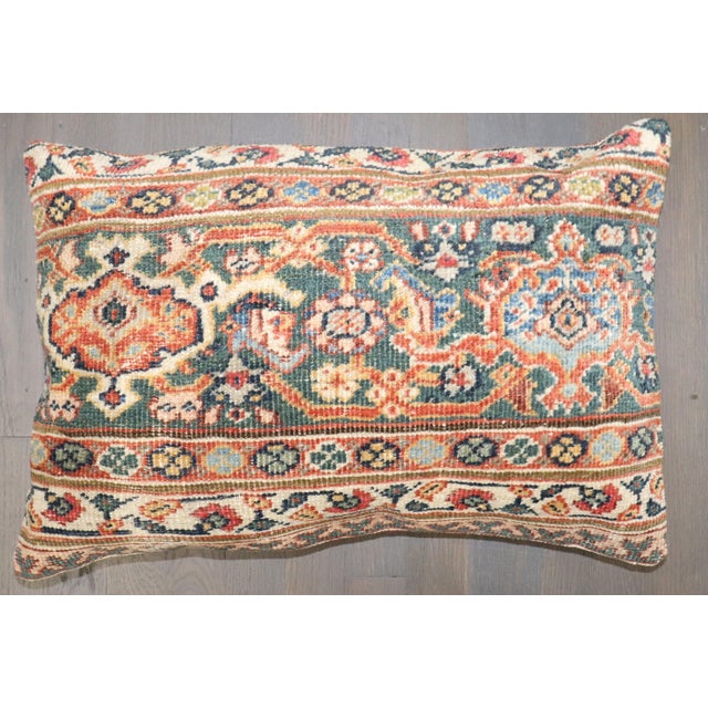 Pillow made from antique Persian Sultanabad Mahal rug with cotton back. Measures: 16'' x 23''.