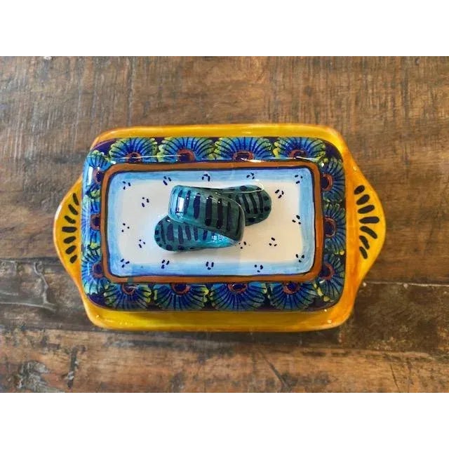 This stunning butter dish in the B-61 peacock design is a Eugenio favorite. Add to an already existing Eugenio collection...