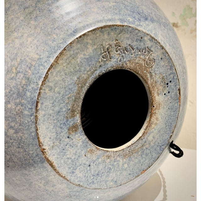 Shade is not included, it is for illustrative purposes only. This piece has an attribution mark, I am sure that it is...