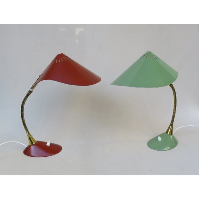 A pair of desk lamps ''Cobra'' Manufacturer: Cosack, rusty brown in the 50s in shades of mint green and in combination...