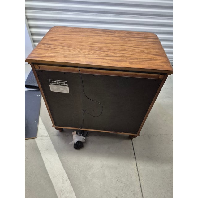 This nightstand is the Palm Bay 3-Drawer Nightstand (Model B1469-01), manufactured by Magnussen Home Furniture. It was...