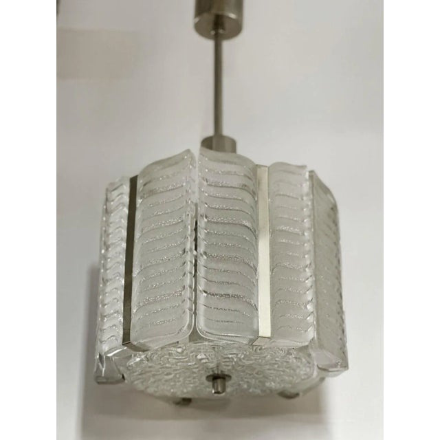 This elegant Austrian chandelier, crafted by Kalmar Vienna in the late 1950s, boasts a nickel-plated metal frame...