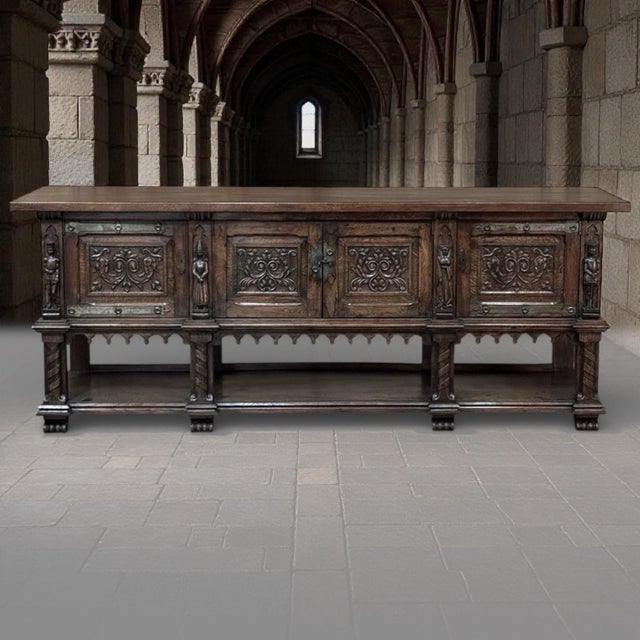 Rich in medieval inspiration and carved with confident detail, this French oak Gothic Revival buffet ~ credenza captures...
