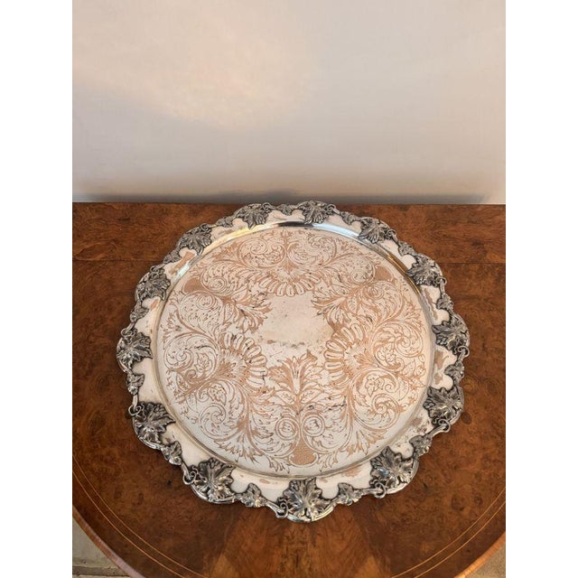 Fine quality antique Victorian silver plated circular tray having a quality antique Victorian circular shaped tray, with a...