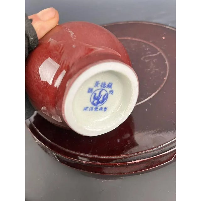 H-17.8cm,W-10cm. This Chinese vintage porcelain vase, crafted by the old porcelain factory, features a beautiful flambé...